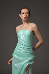 Green sequined corseted dress