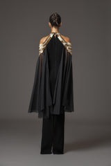 Black crêpe dress with embroidery and cape sleeves