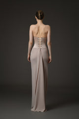 Nude corseted crêpe dress with exquisite draping