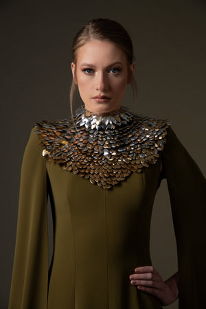 Olive green crêpe dress with 3D leaf embellishment and cape sleeves