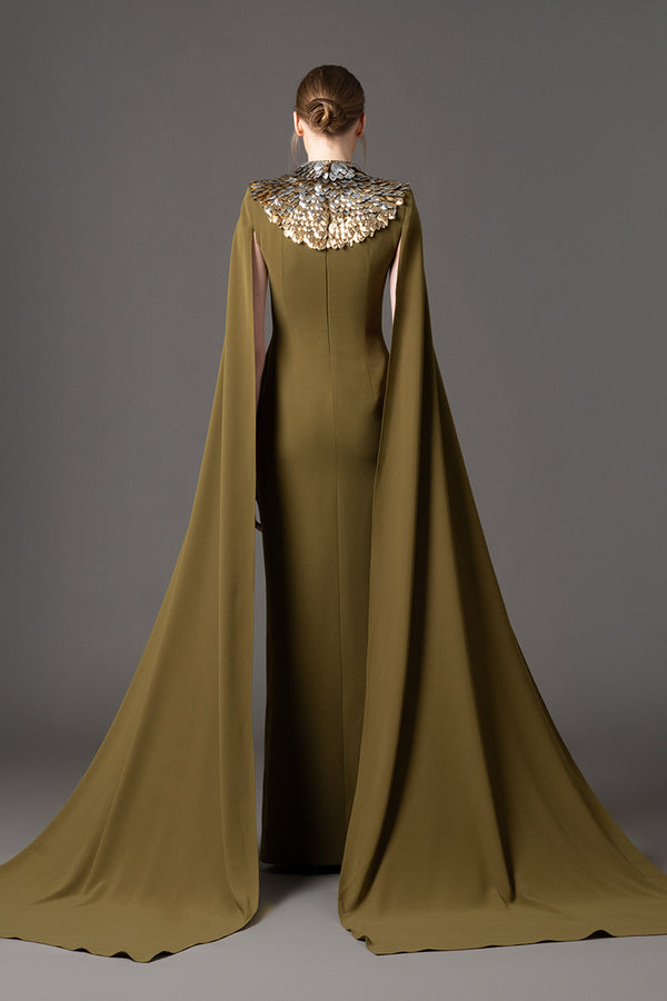 Olive green crêpe dress with 3D leaf embellishment and cape sleeves