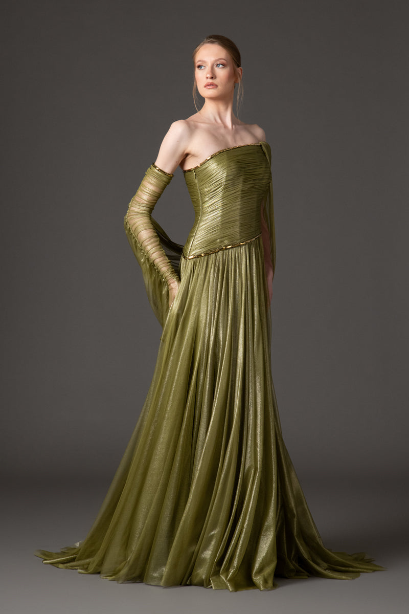 Asymmetric draped dress in olive green silk foiled tulle with baguette detailng