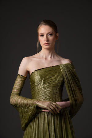 Asymmetric draped dress in olive green silk foiled tulle with baguette detailng