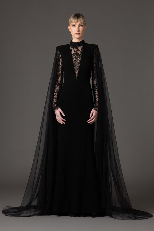 Black crêpe dress with embroidered detailing and cape sleeves