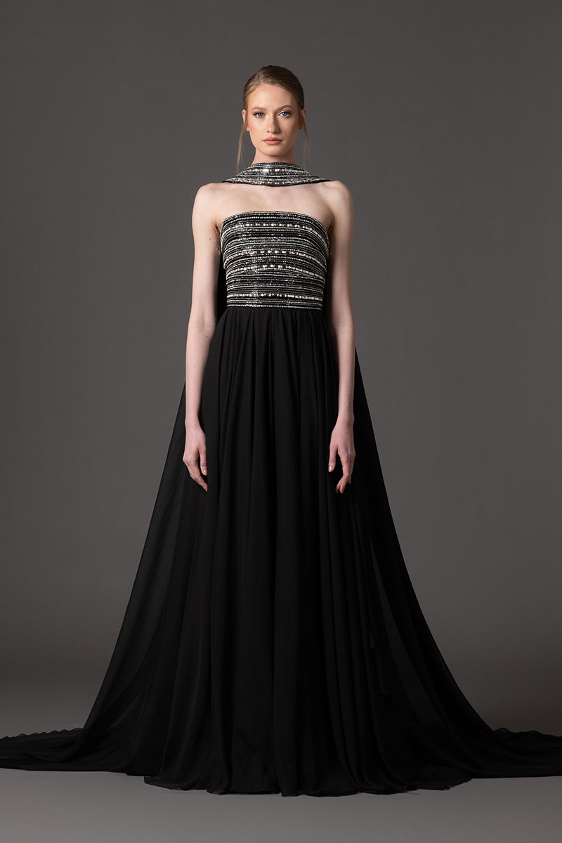 Embroidered black dress with chiffon skirt and cape