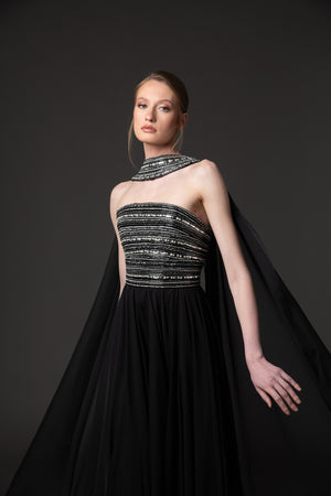 Embroidered black dress with chiffon skirt and cape