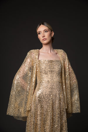 Embroidered gold cape dress