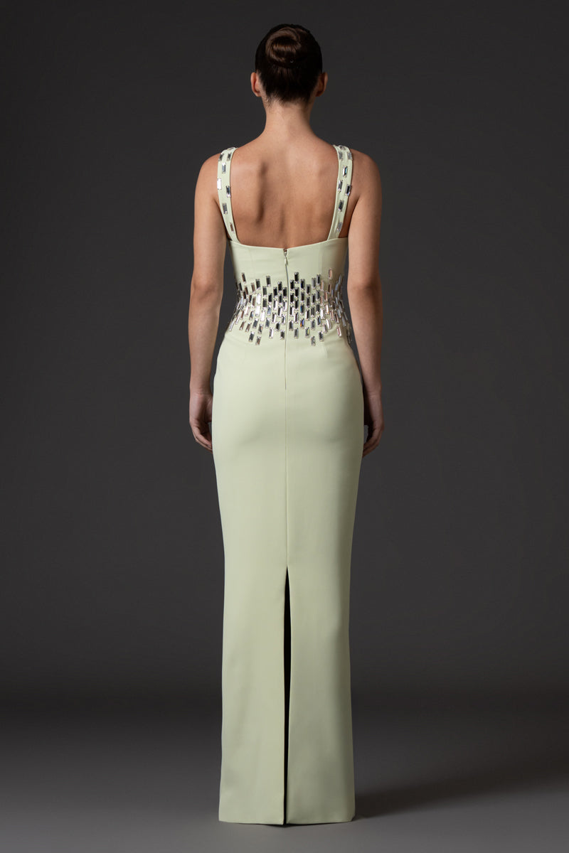 Light pistachio crêpe dress, featuring baguette embroidered neckline and waistline