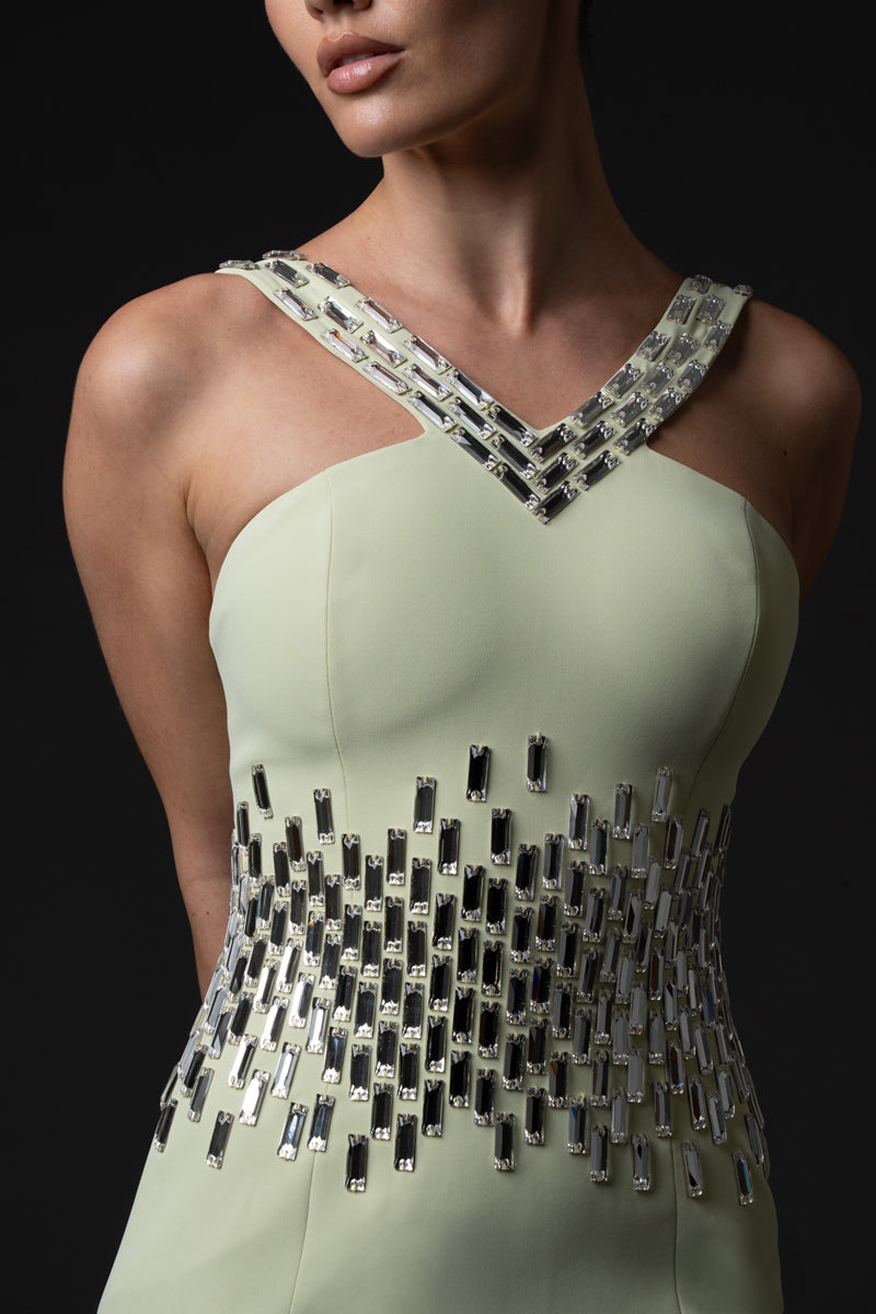 Light pistachio crêpe dress, featuring baguette embroidered neckline and waistline