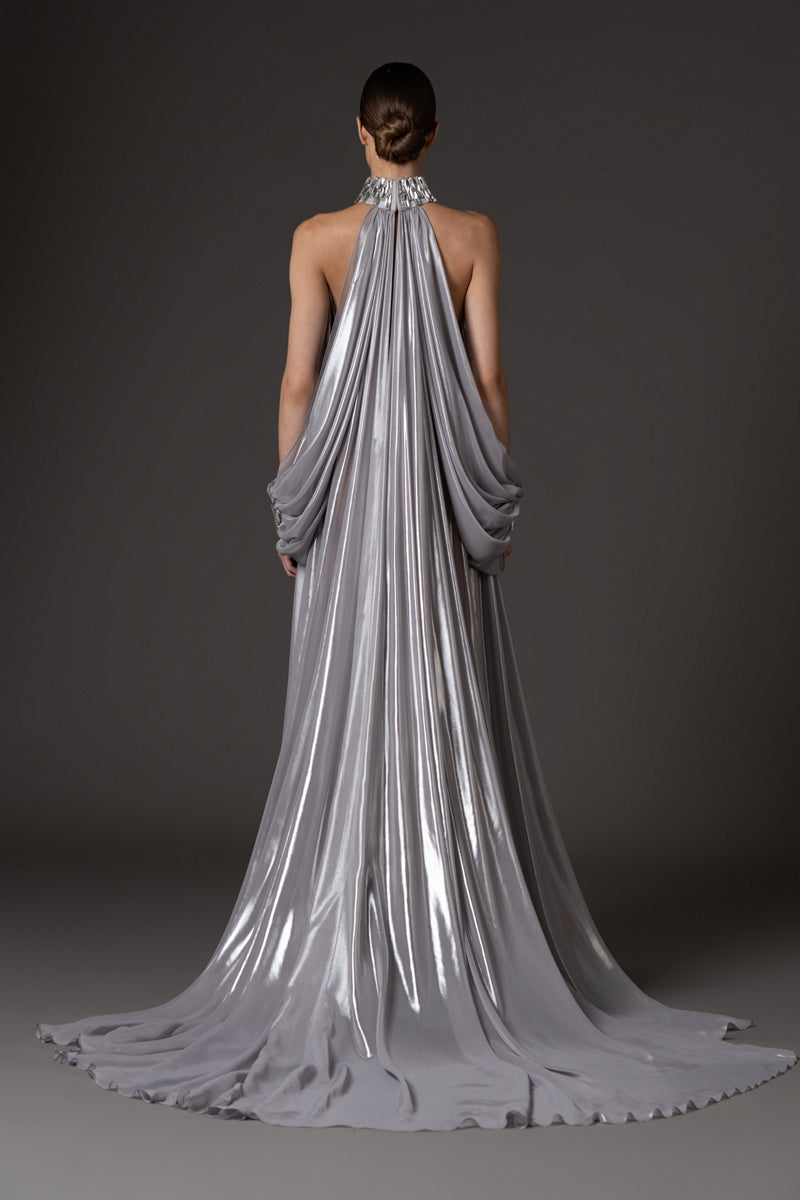 Silver chiffon lamé dress with halter neck and sleeves, featuring baguette embroidery  on neckline and cuffs