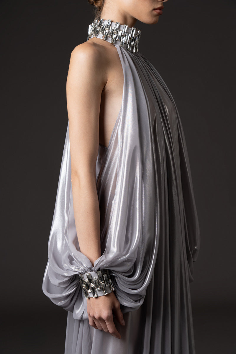 Silver chiffon lamé dress with halter neck and sleeves, featuring baguette embroidery  on neckline and cuffs