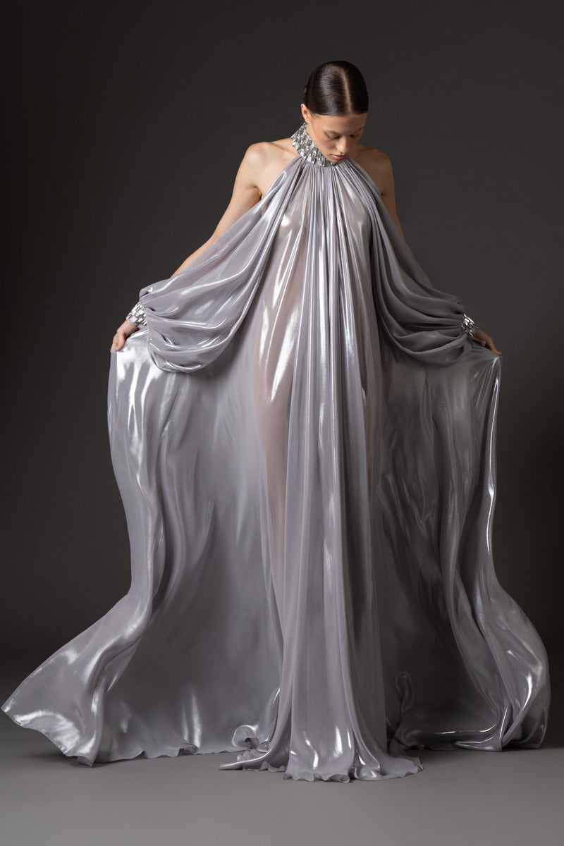 Silver chiffon lamé dress with halter neck and sleeves, featuring baguette embroidery  on neckline and cuffs