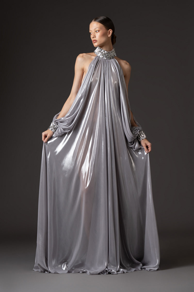 Silver chiffon lamé dress with halter neck and sleeves, featuring baguette embroidery  on neckline and cuffs