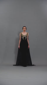 Black crêpe dress with embroidery and chiffon cape