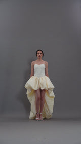 Ivory corseted short crêpe dress with a taffeta skirt and embroidery