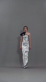 Grey sequined asymmetric dress with a bow detailing