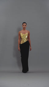 Black corseted crêpe dress with gold embroidery