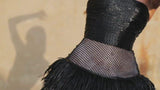 Sleeveless black corseted bustier ballgown fully embroidered with bugle beads macro sequins and layered twisted plumes