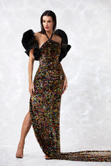 Open back halter dress in iridescent fish scale sequins and a bolero in taffeta exploded ruffles