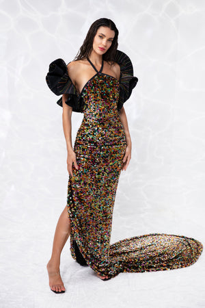 Long fitted halter dress in iridescent fish scale sequins and a bolero in taffeta exploded ruffles