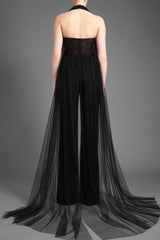 Black jumpsuit with a draped tulle corset and structured crêpe pants
