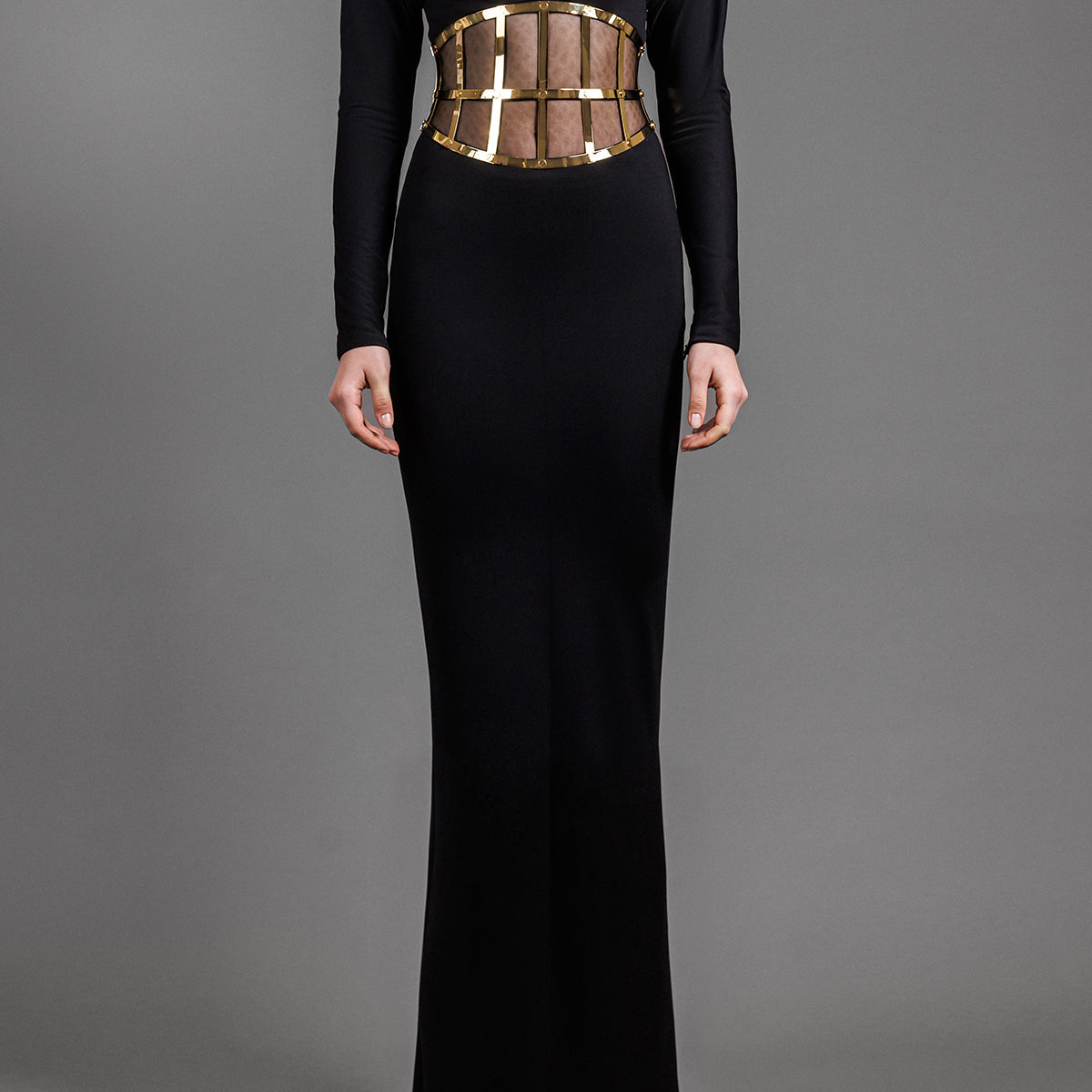 Black jersey hooded dress with a metal visible corset belt