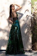 Emerald green sequined dress with black tulle corset