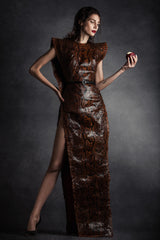 Genuine python dress with structured shoulders and built in belt