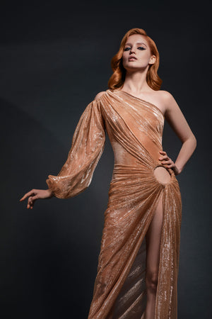 One sleeve nude lamé gown with intricate draping