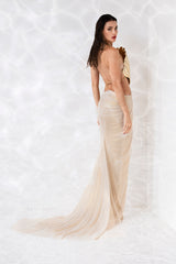 Gold-plated scallop shell corset studded with crystals, worn with a draped skirt in gold foiled silk tulle