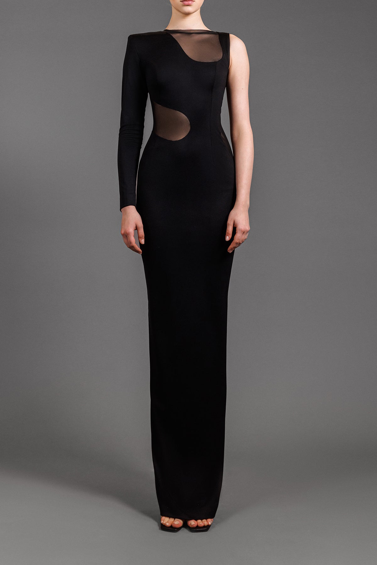 Black jersey dress with tulle cut-outs