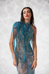 Halter top sheer dress embroidered with waves of cyan, navy, turquoise, aqua, sky blue, and aquamarine crystal beads.