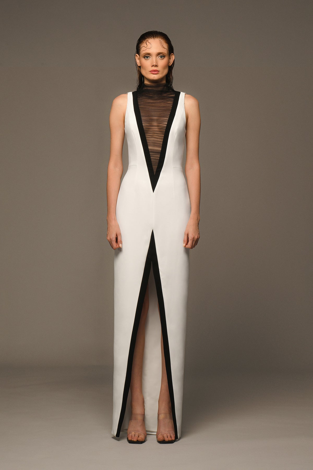 White crêpe dress with exaggerated deep V neckline in tulle