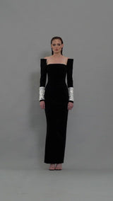 Strapless black velvet dress with crystal baguettes on sleeves