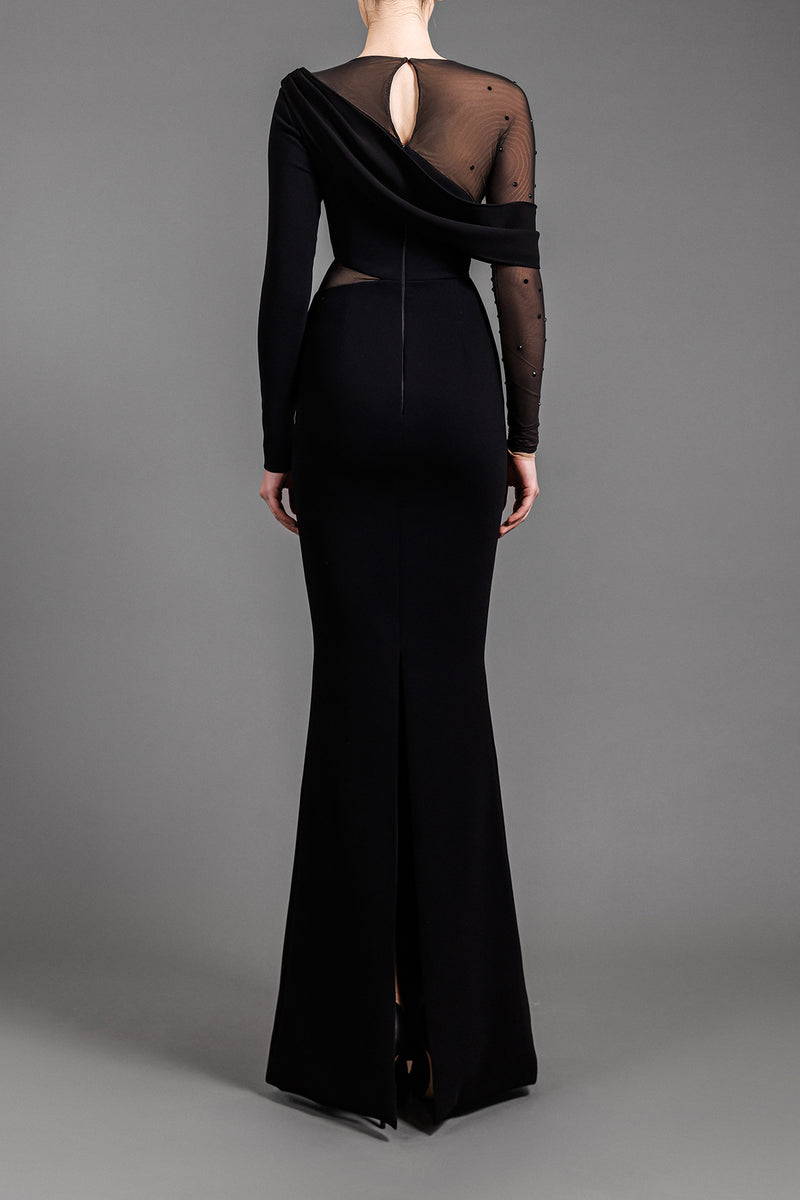 Long sleeved asymmetrical black crêpe dress with tulle and black crystals