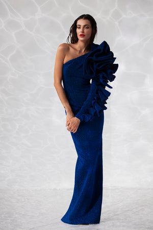 Long asymmetric dress in deep ocean blue lurex and a sleeve with exploded ruffles