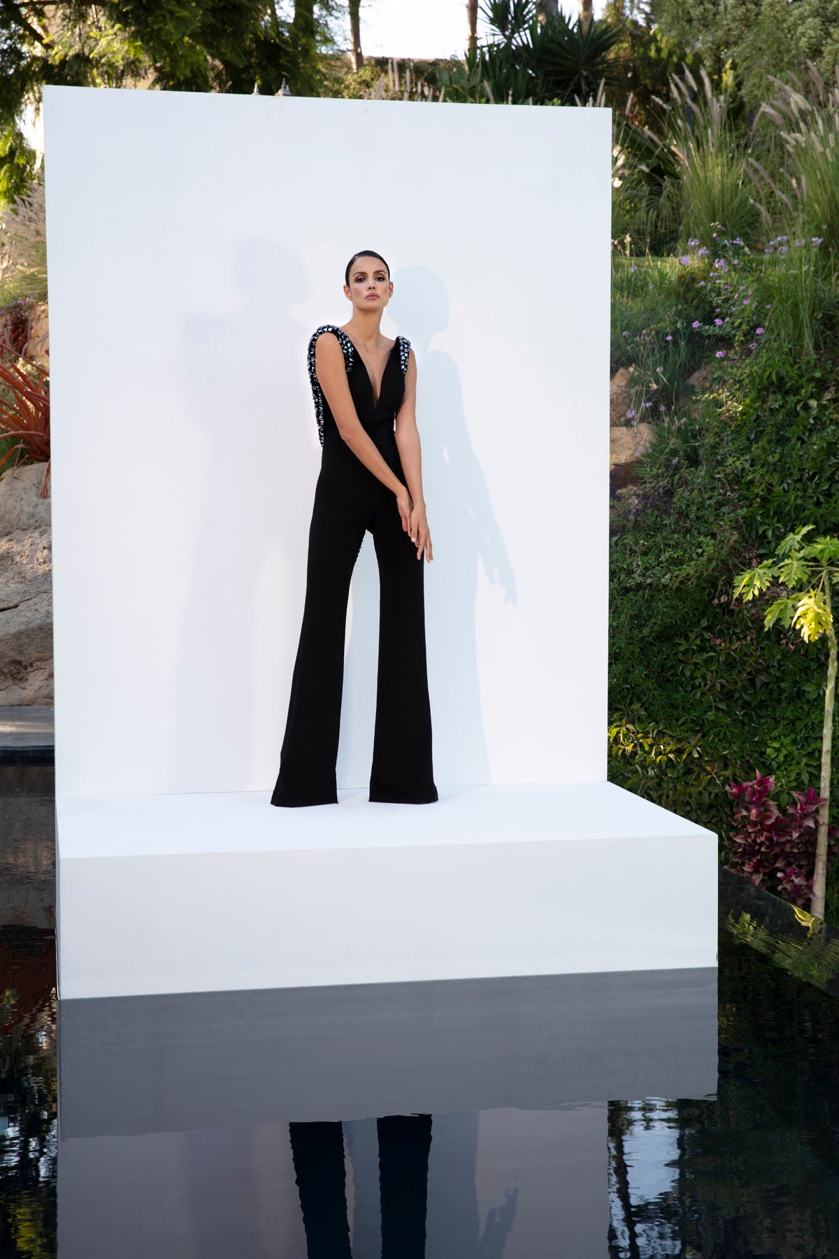 Black crêpe jumpsuit with open back