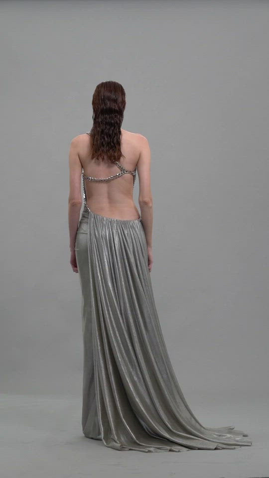 Backless asymmetrical silver dress with chains