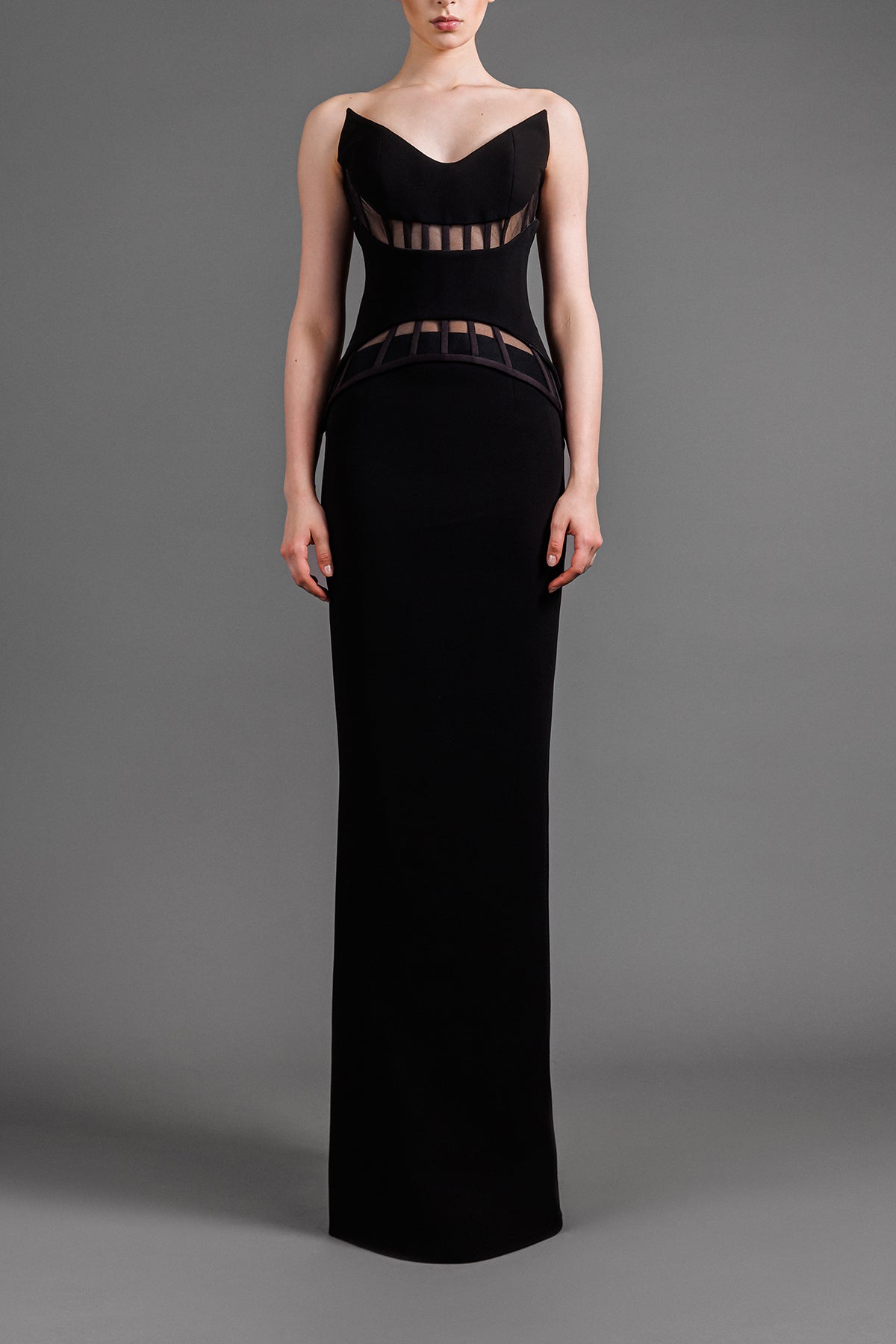 Black crêpe dress with a visible corset