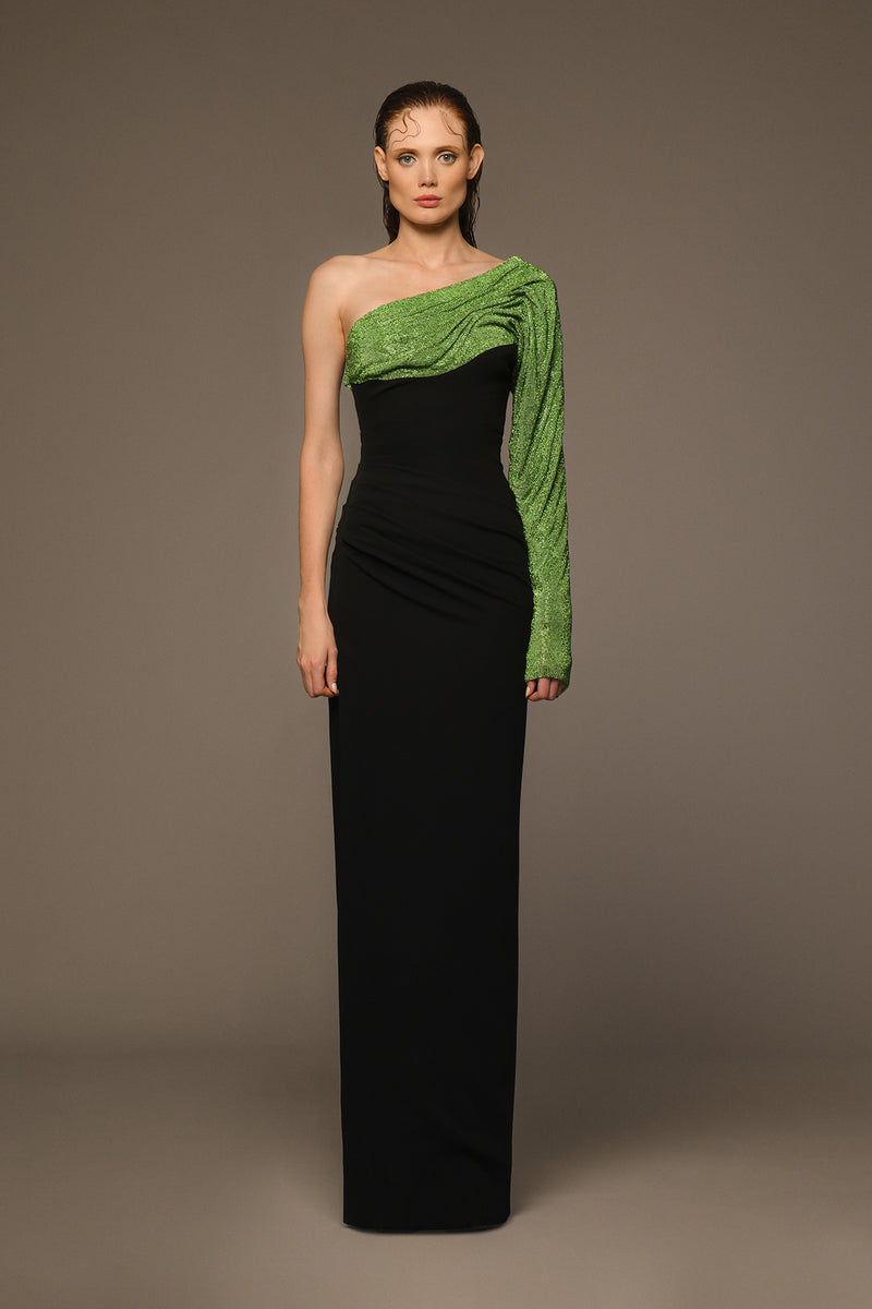 Asymmetrical black crêpe dress with green crystal chainmail