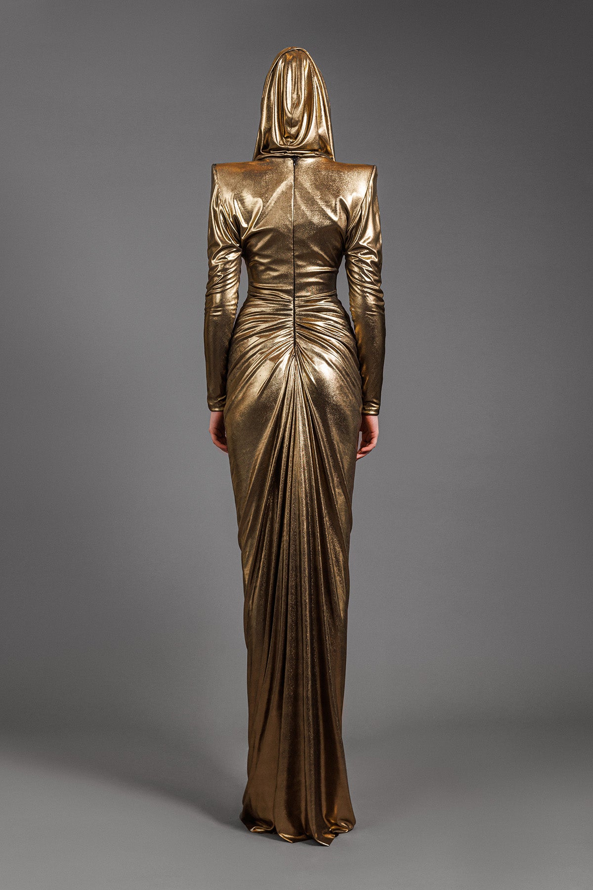 Draped liquid gold dress with loose hoodie