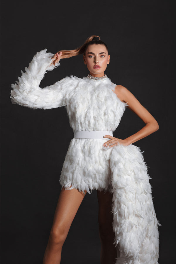Asymmetrical white mini dress in layered plumes featuring an embroidered neckline and a dramatic wing-shaped overskirt