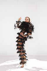 Black tulle dress with layered feathers