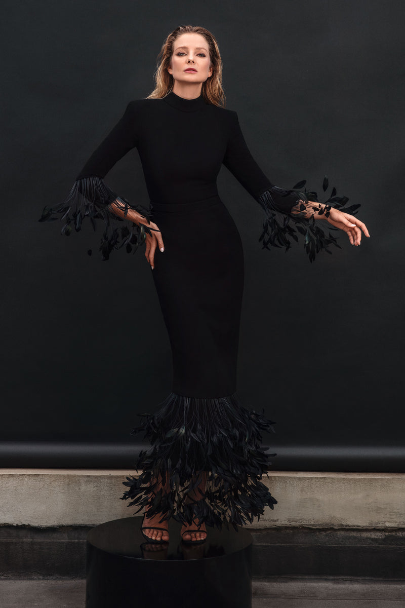 Black silk crêpe dress with feathers