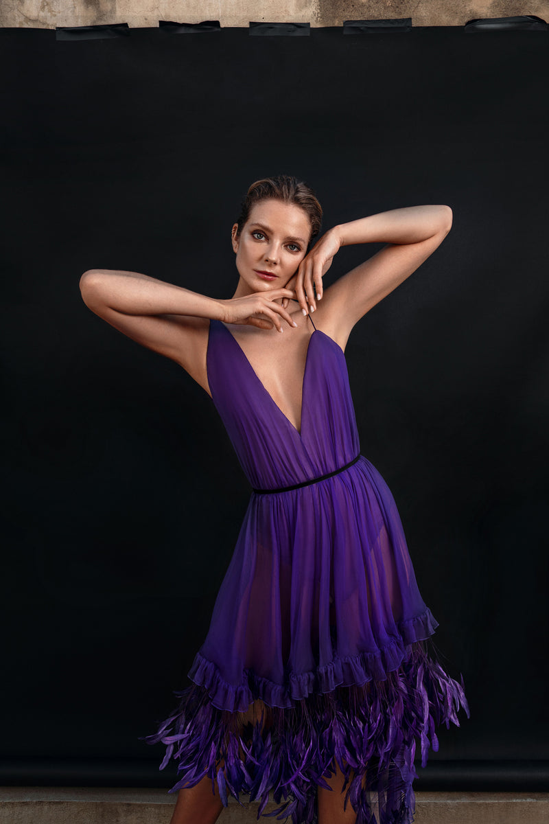 Asymmetrical purple mini dress