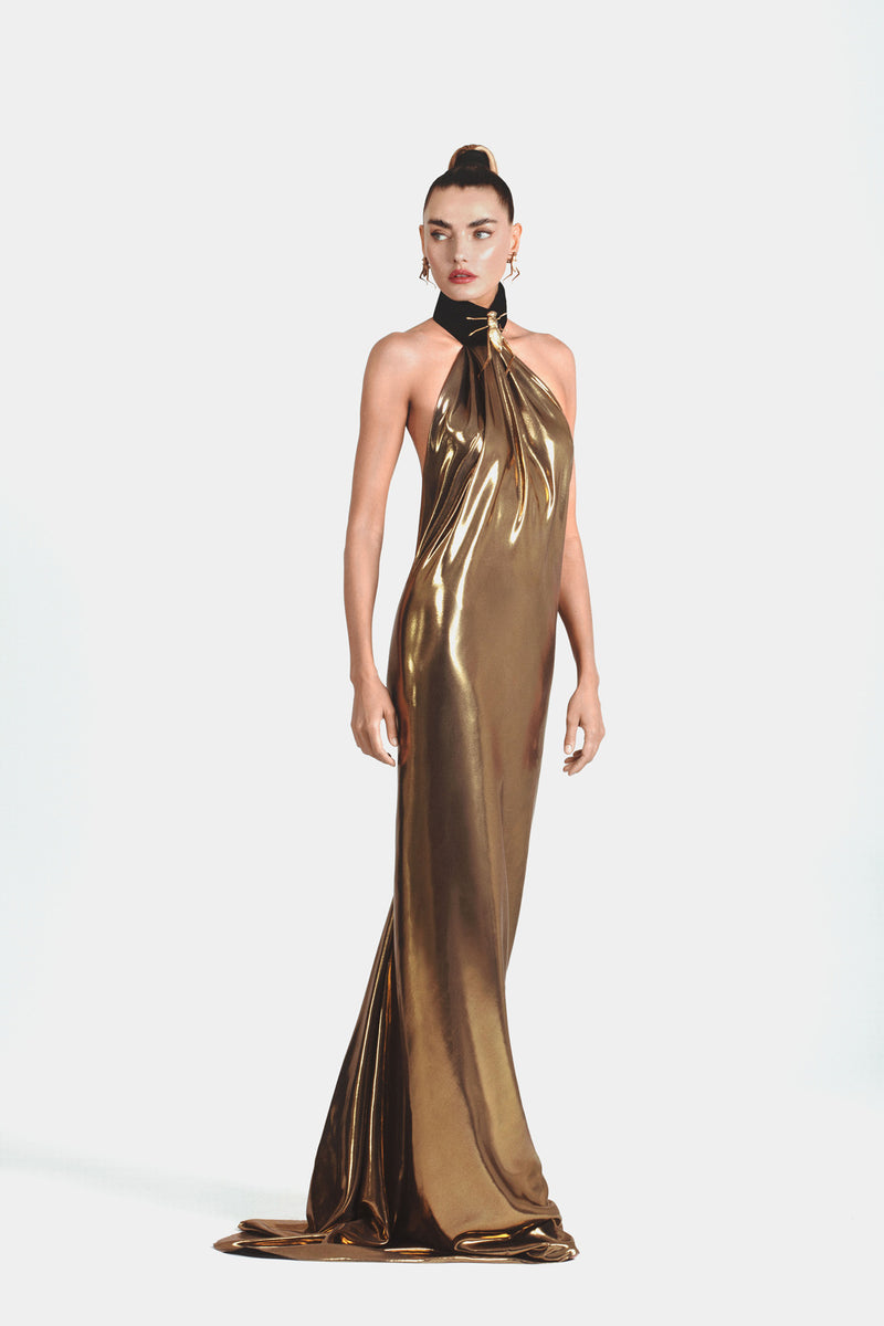 Backless dress in liquid gold chiffon featuring handcrafted grasshoppers from solid brass and finished with hand-applied antique gold