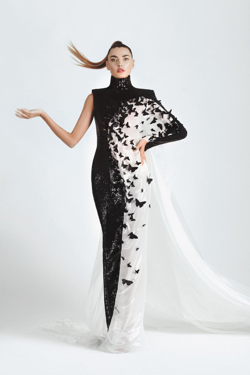 One sleeve asymmetric dress in jet black sequins and white liquid chiffon embellished with 3D laser-cut butterflies