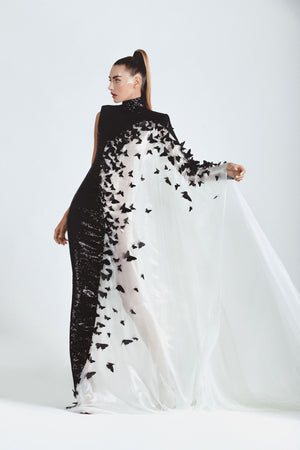 Structured dress in jet black sequins and white liquid chiffon embellished with 3D laser-cut butterflies