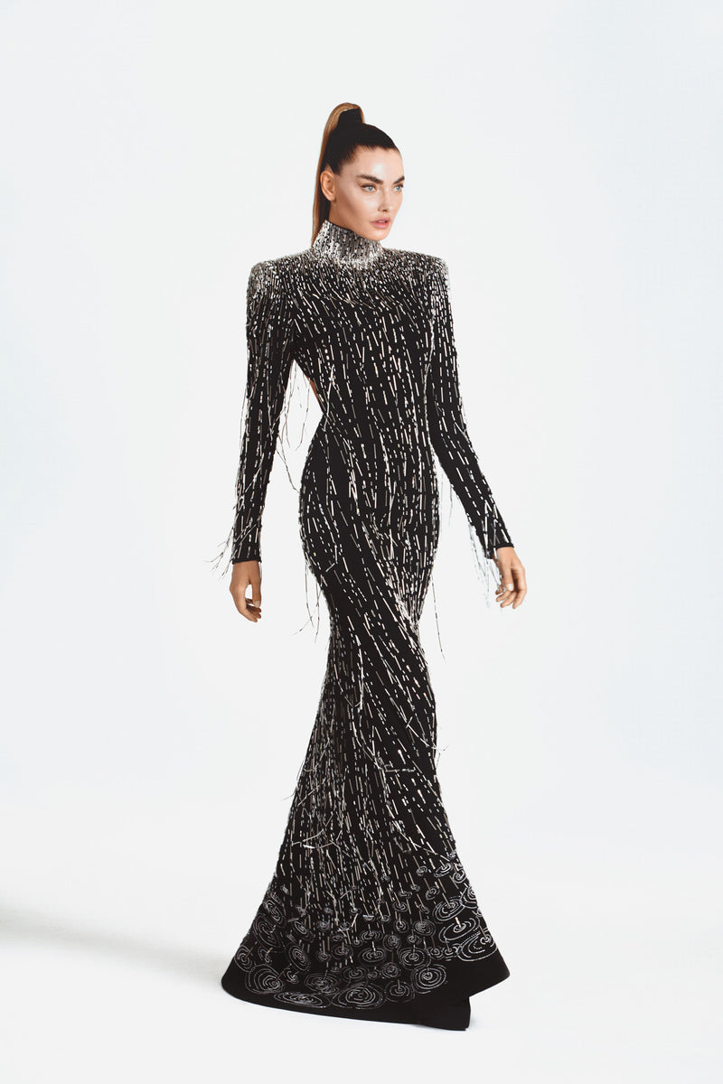 Black silk crêpe dress embroidered with bugle beads, crystal baguettes and hanging beaded fringes finished with water ripples effect at the hemline 