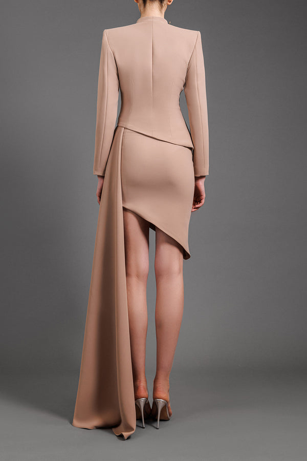 Nude ensemble with a structured blazer with metal detailing and draped skirt